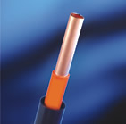Coated copper tubing with high density polyethylene (HDPE) outer sleeve